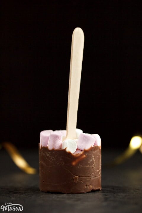 Milk hot chocolate stick topped with mini marshmallows