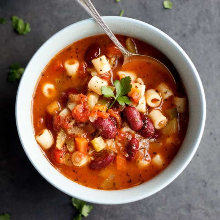 Minestrone Soup in a bowl with a spoon