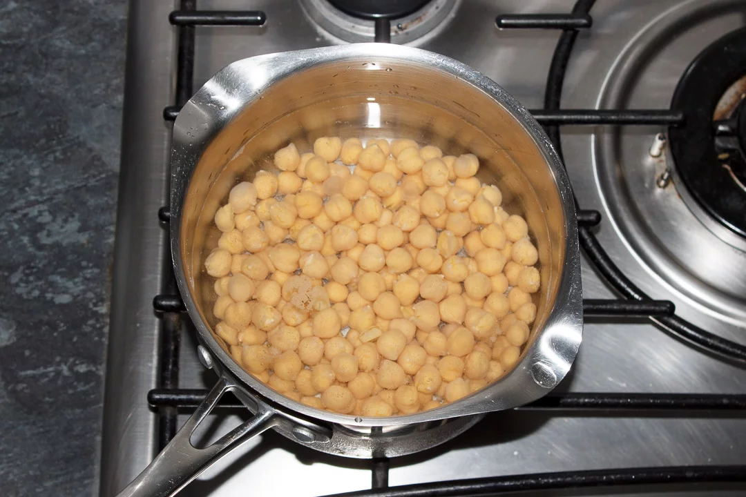Chickpeas in a saucepan covered with water