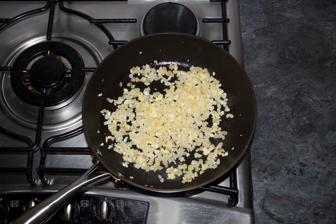 Onion, garlic and ginger frying in a pan