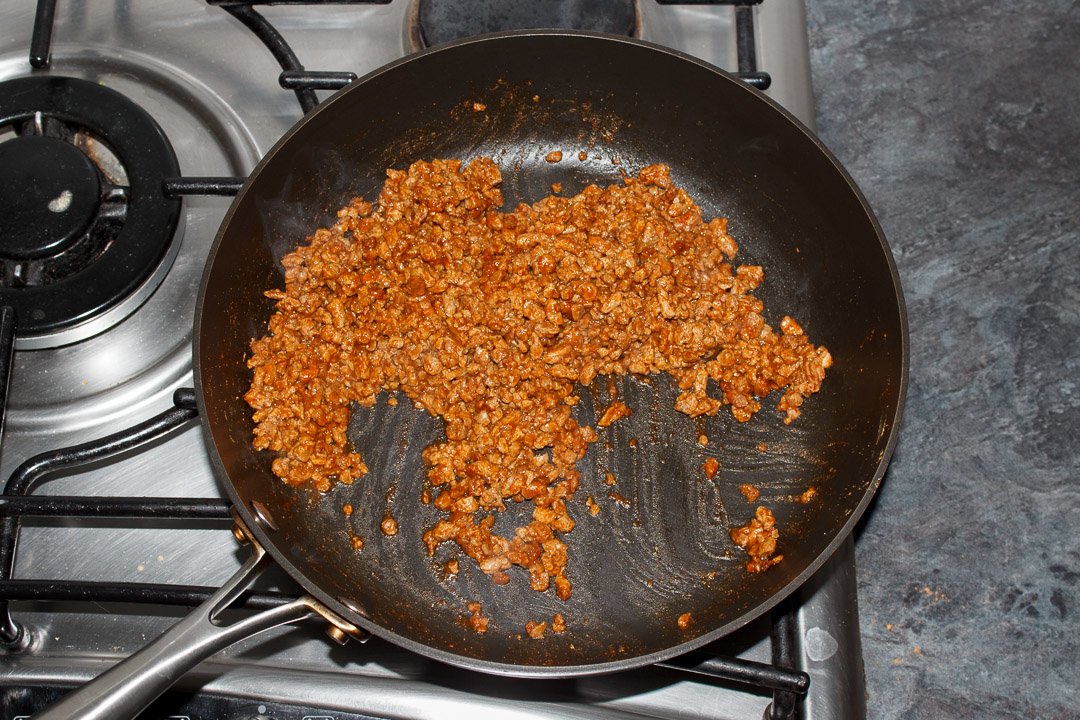 Cooked taco seasoned soya mince in a frying pan