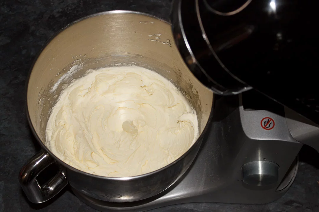 Lemon buttercream icing in an electric stand mixer