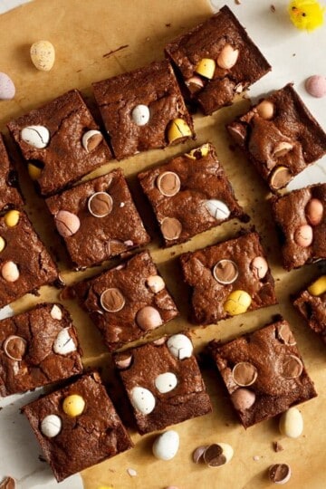 Mini Egg brownies sliced into bars on baking paper