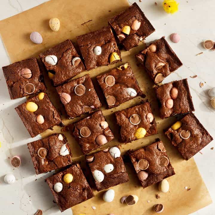 Mini Egg brownies sliced into bars on baking paper