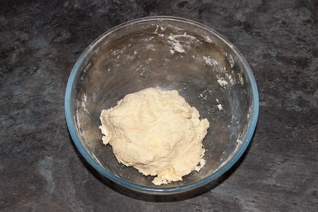 Shortcrust pastry in a large glass bowl