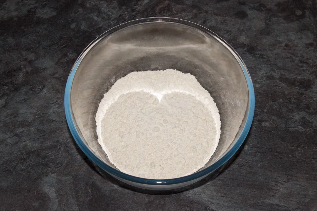 Flour and salt in a large glass bowl