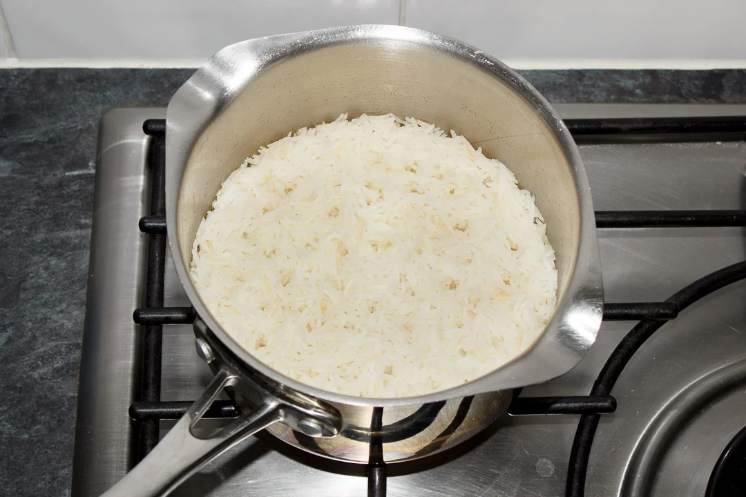 freshly cooked rice in a saucepan