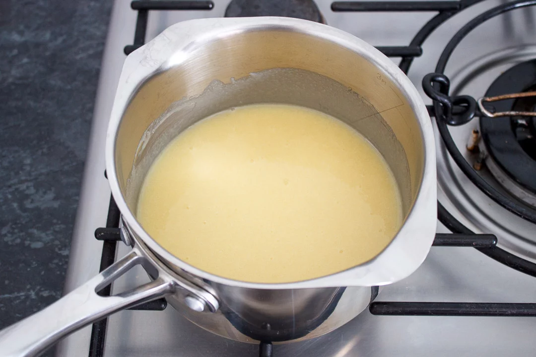 Melted caramel ingredients in a large saucepan over a low heat
