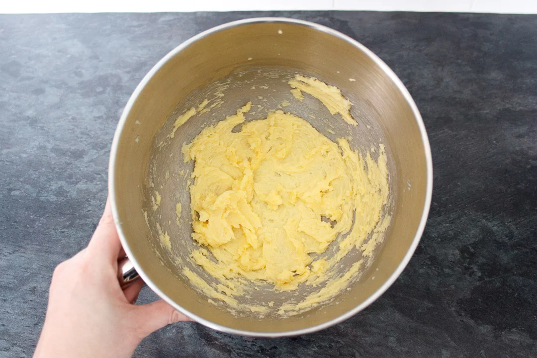softened butter in the bowl of an electric stand mixer