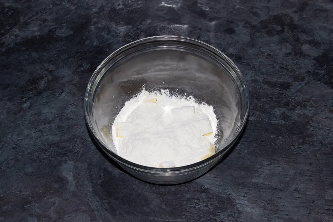 Butter, sugar, salt and flour in a glass bowl