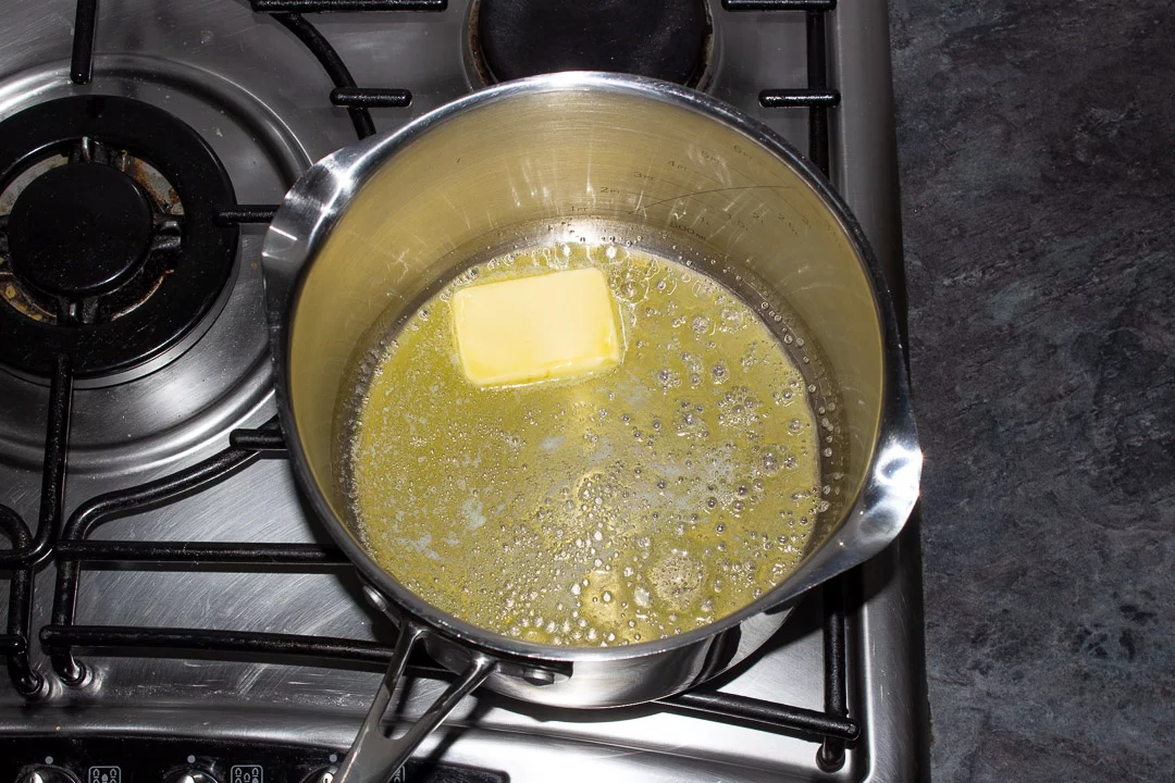 butter melting in a saucepan on the hob