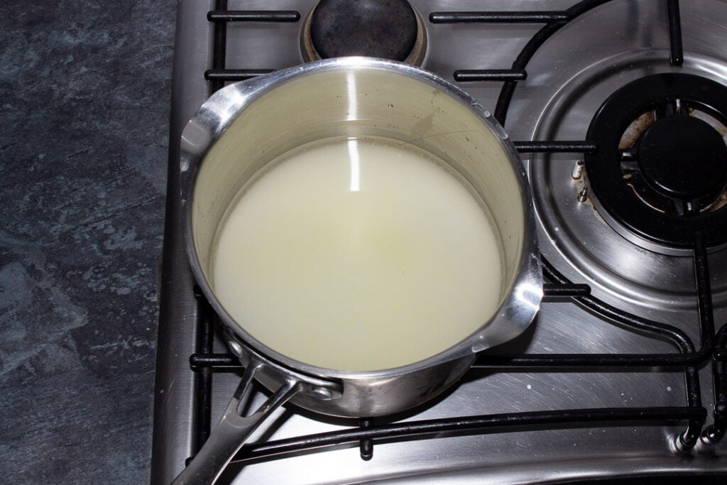 Sugar, lemon juice and water in a saucepan on the hob