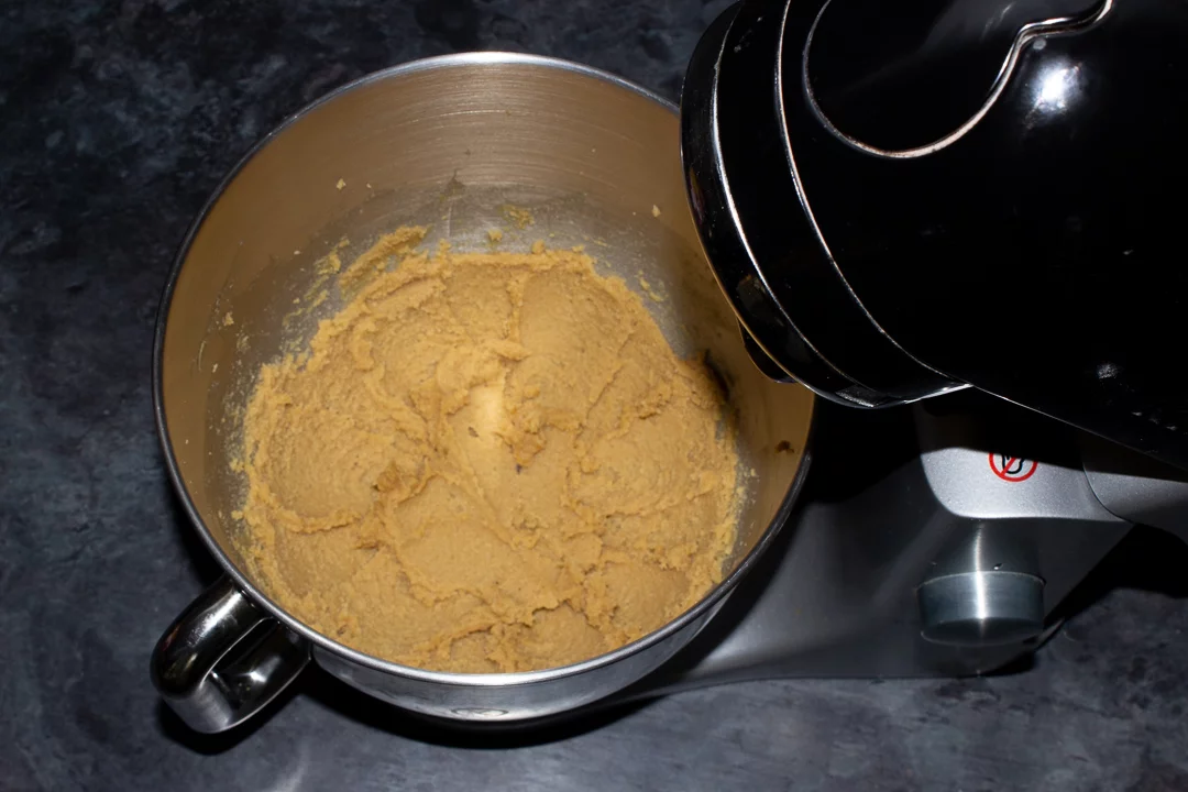 Brown sugar, caster sugar and butter creamed together in the bowl of an electric stand mixer