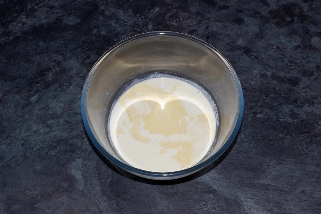 Baileys and double cream in a glass bowl