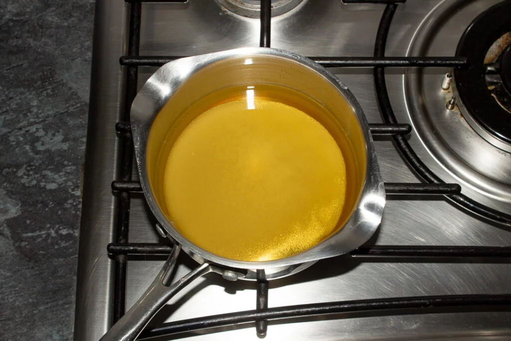 Cider vinegar, sugar and salt in a small saucepan over a low heat on the stove