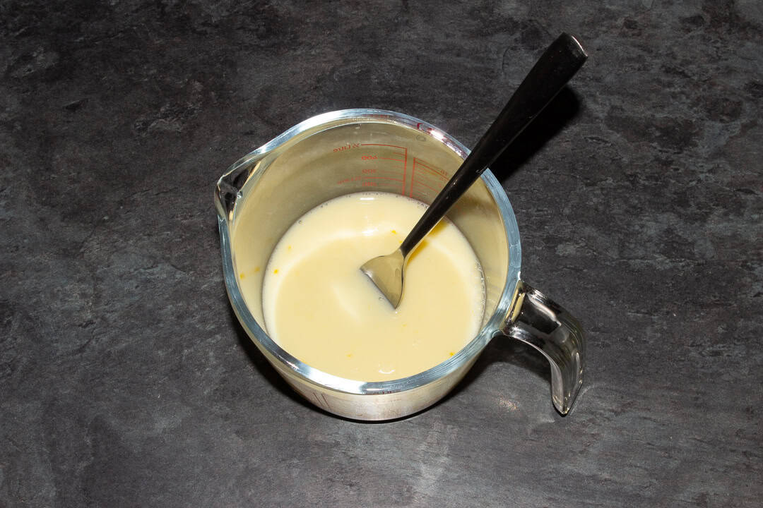 Egg, milk and water beaten together in a jug.