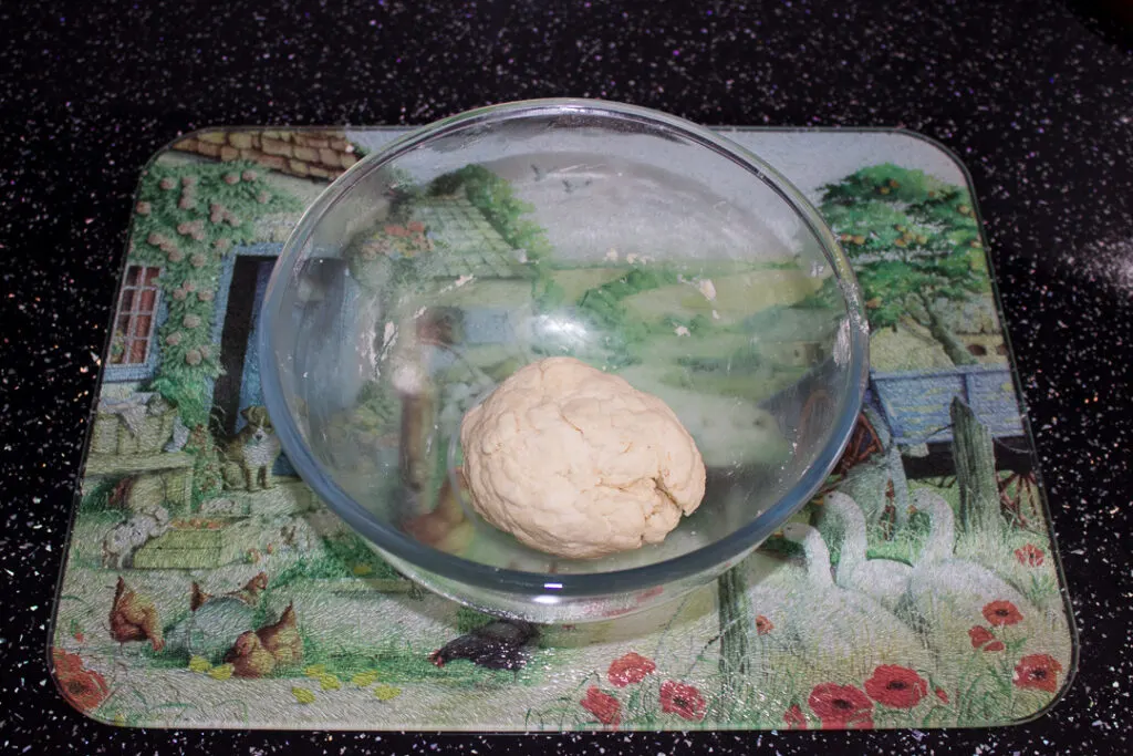 shortcrust pastry in a mixing bowl on a kitchen worktop