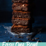 A stack of 5 chocolate brownies. A text overlay says "easy one bowl brownies"