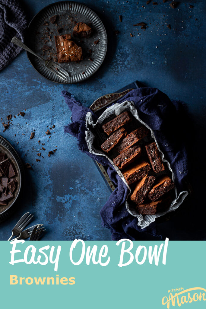 Chocolate brownies in a loaf tin and one on a plate. A text overlay says "easy one bowl brownies"