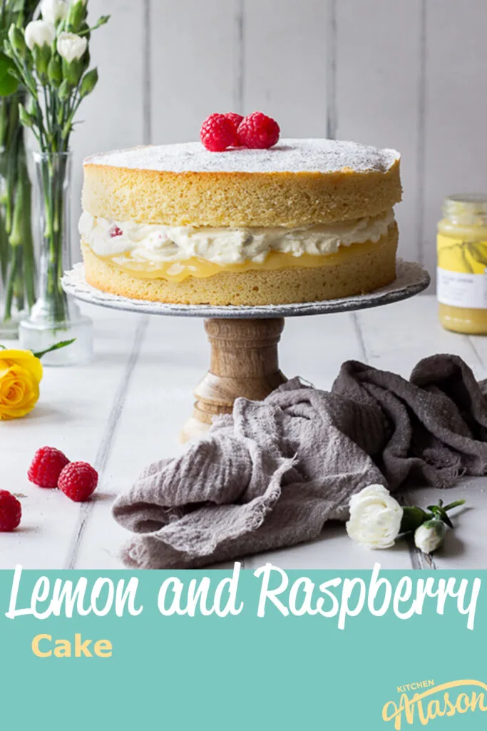 A raspberry lemon cake on a cake stand. A text overlay says "lemon and raspberry cake".