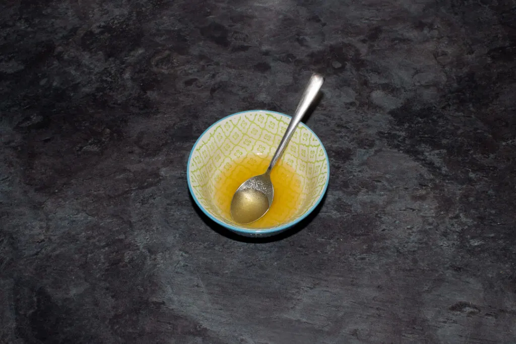 Lemon sugar syrup in a small bowl.
