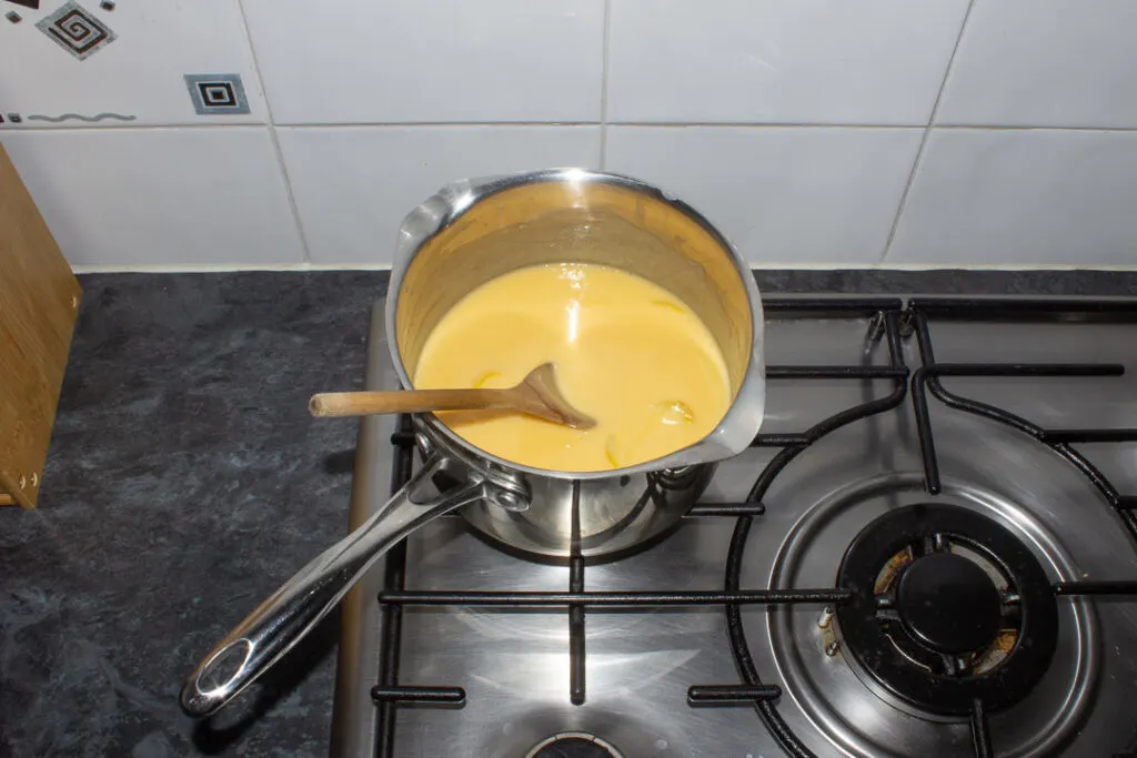 Thickened lemon custard in a saucepan