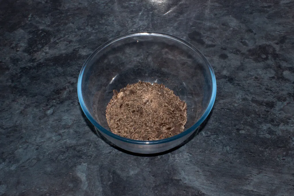 Finely chopped chocolate in a bowl