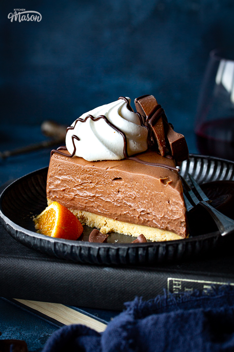 Close up of a slice of Terry's chocolate orange cheesecake