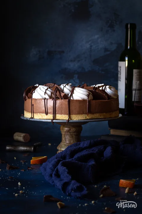 Front view of a decorated chocolate orange cheesecake