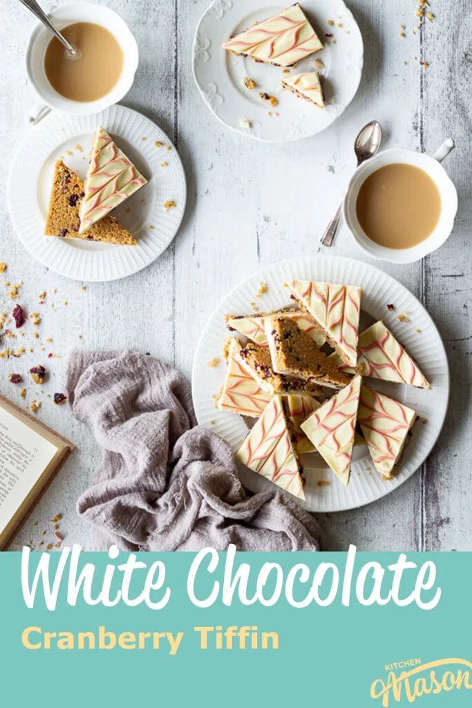 3 plates of white chocolate tiffin. A text overlay says White Chocolate Cranberry Tiffin.