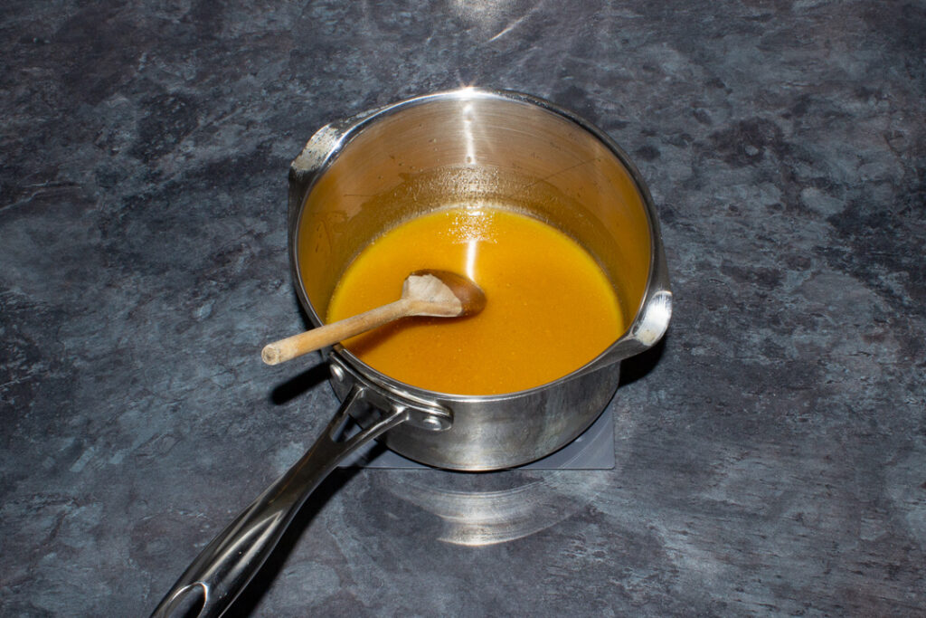 A melted butter and sugar syrup in a saucepan