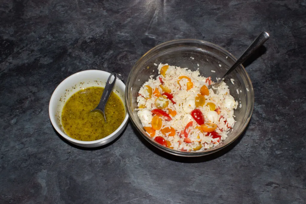 Salad dressing being added to an easy rice salad