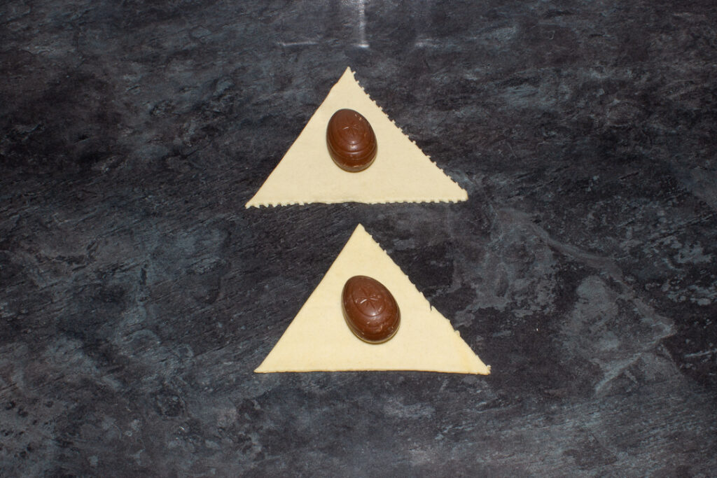 Cadbury's Creme Eggs in triangles of croissant dough