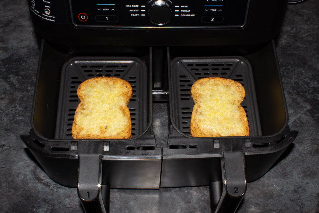 2 slices of cheese on toast in an air fryer