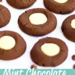 Mint chocolate thumbprint cookies on a white tablecloth. A text overlay says 'mint chocolate thumbprint cookies'.