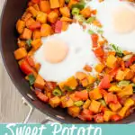 Sweet potato breakfast hash and eggs in a frying pan. A text overlay says 'sweet potato breakfast hash'.