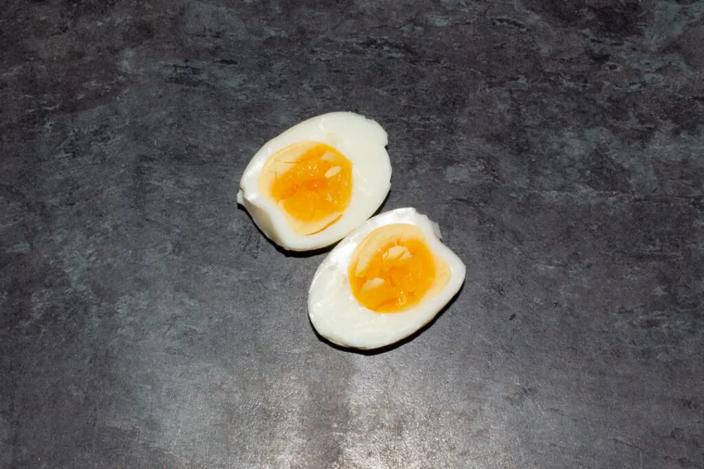 An air fryer hard boiled egg peeled and cut in half
