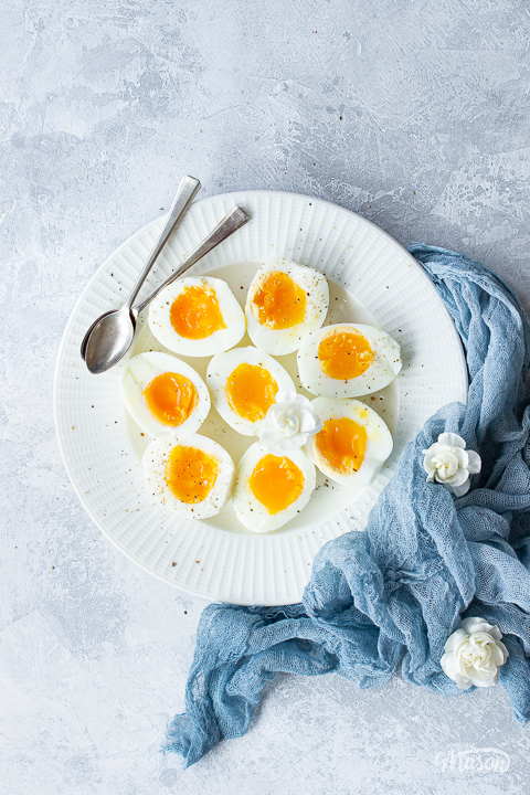 Air fryer boiled eggs and spoons on a plate