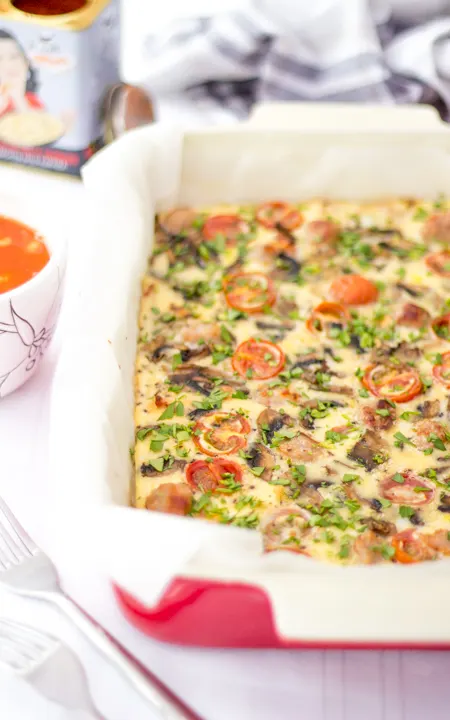 A full English baked frittata in an oven proof dish