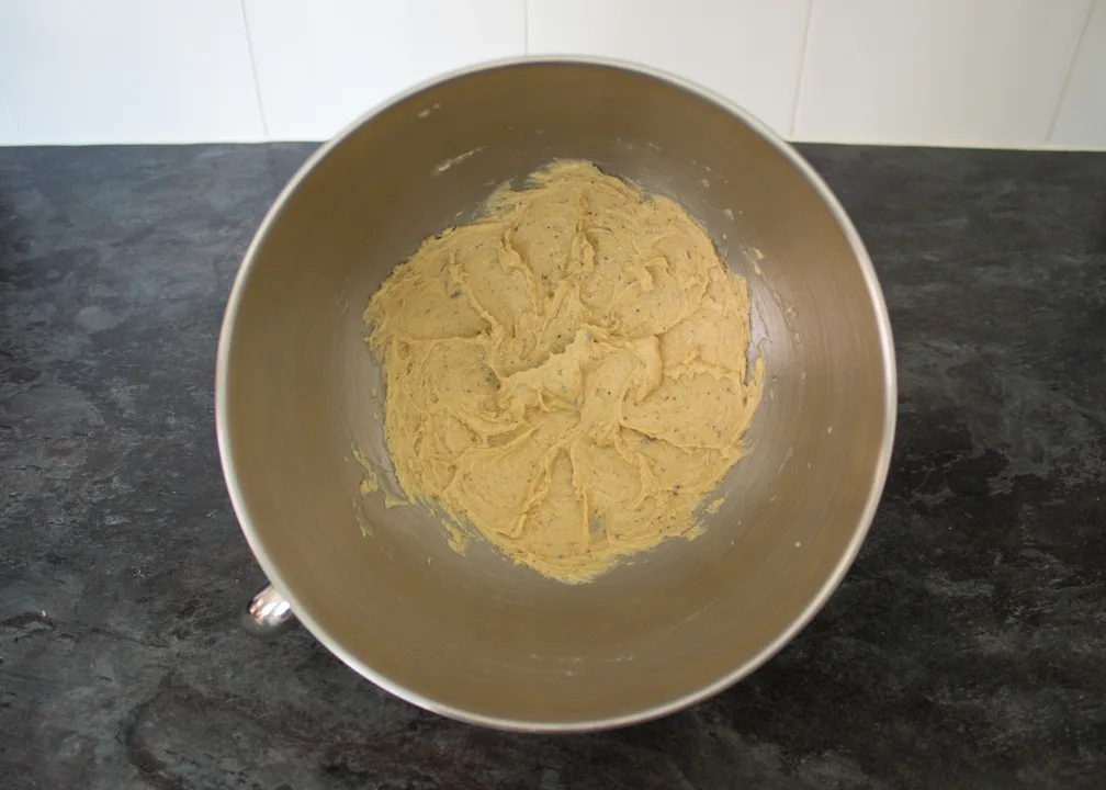 Butter and sugar creamed together in a stand mixer bowl