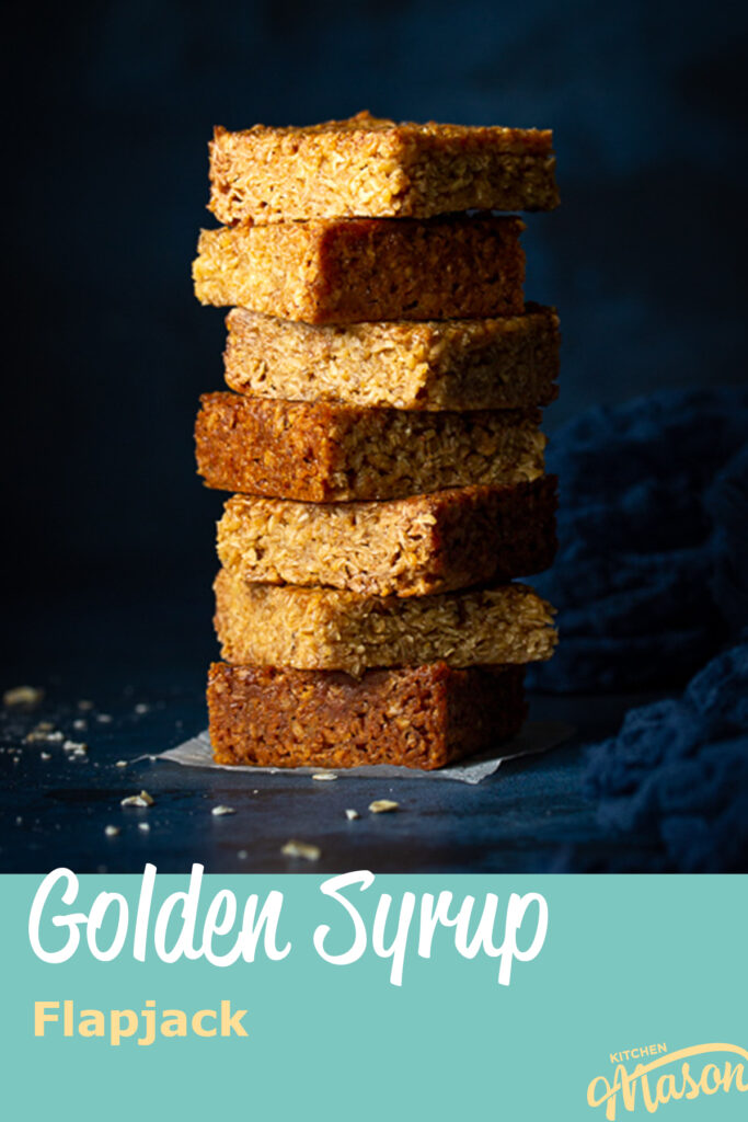 7 bars of golden syrup flapjack in a stack. A text overlay says 'golden syrup flapjack'