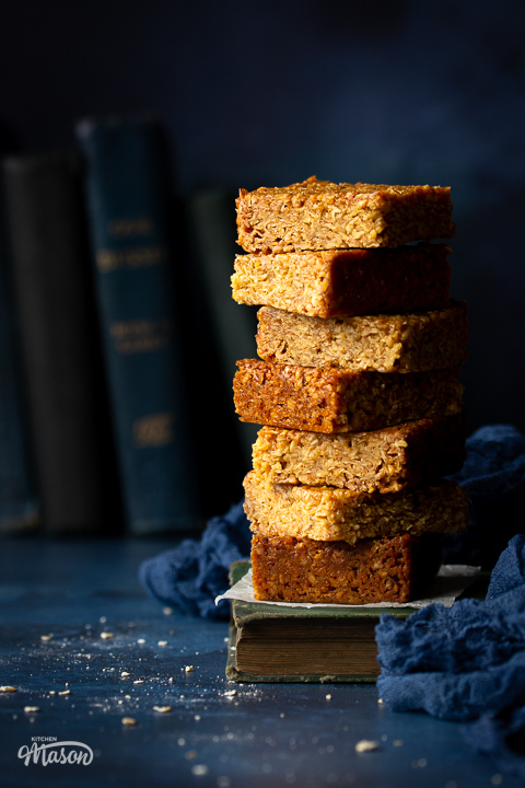 A stack of soft flapjacks on top of a book