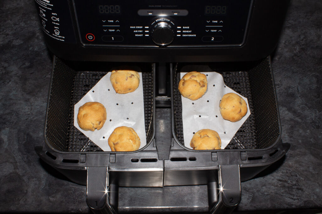 Six air fryer cookies in a Ninja air fryer