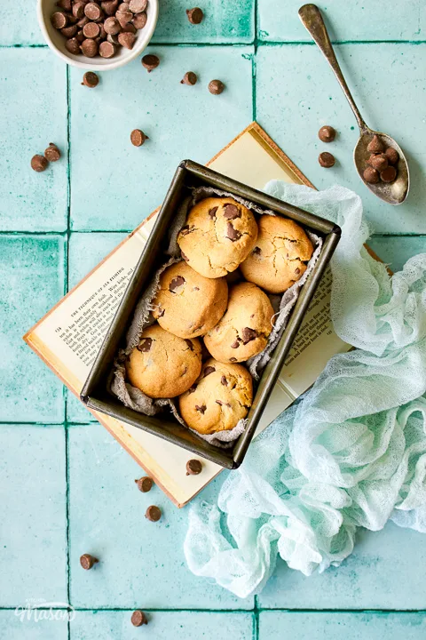 Air fryer cookies in a loaf tin on a book