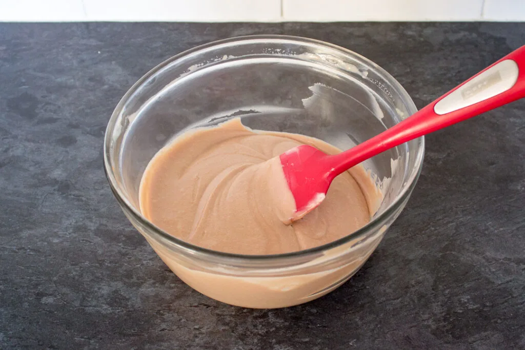 No churn Nutella ice cream mixture in a large mixing bowl