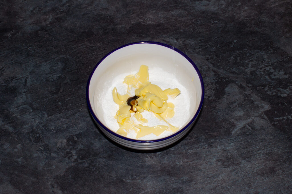 Butter, icing sugar and vanilla in a small bowl