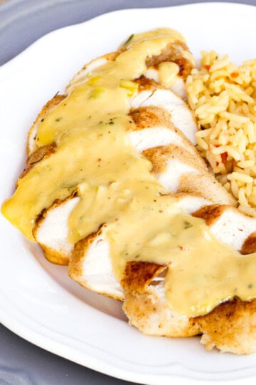 Creamy honey mustard chicken on a plate with rice