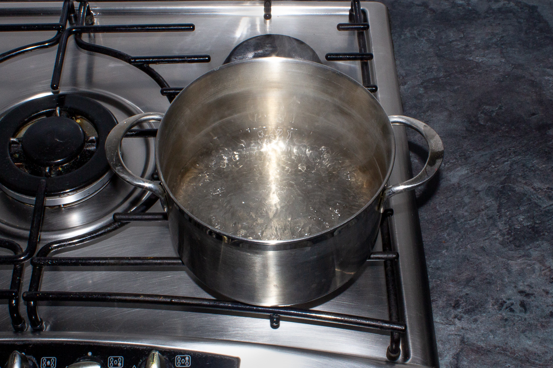 Water boiling in a steamer pot