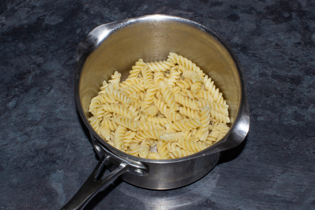 Drained, cooked pasta in a saucepan