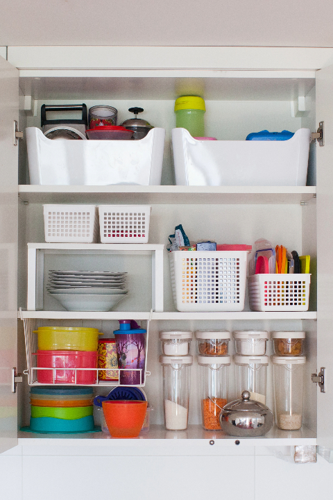 A cupboard filled with kitchen organisation ideas
